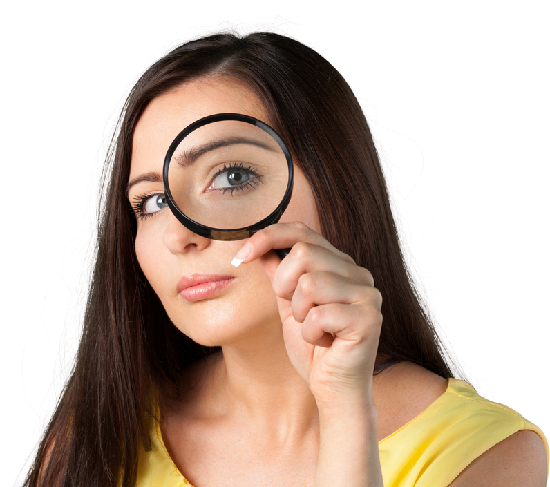 Woman with Magnifying Glass